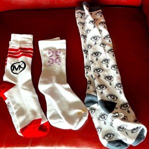 Three pairs of tall socks (Glossier, Michael Kors, and eyes) NWOT